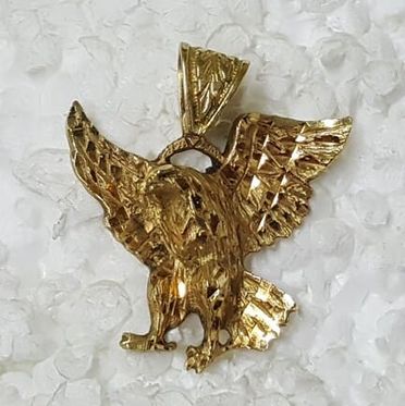 broche de oro